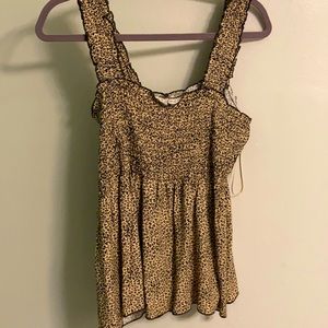 Cheetah shirt with subtle peplum flare